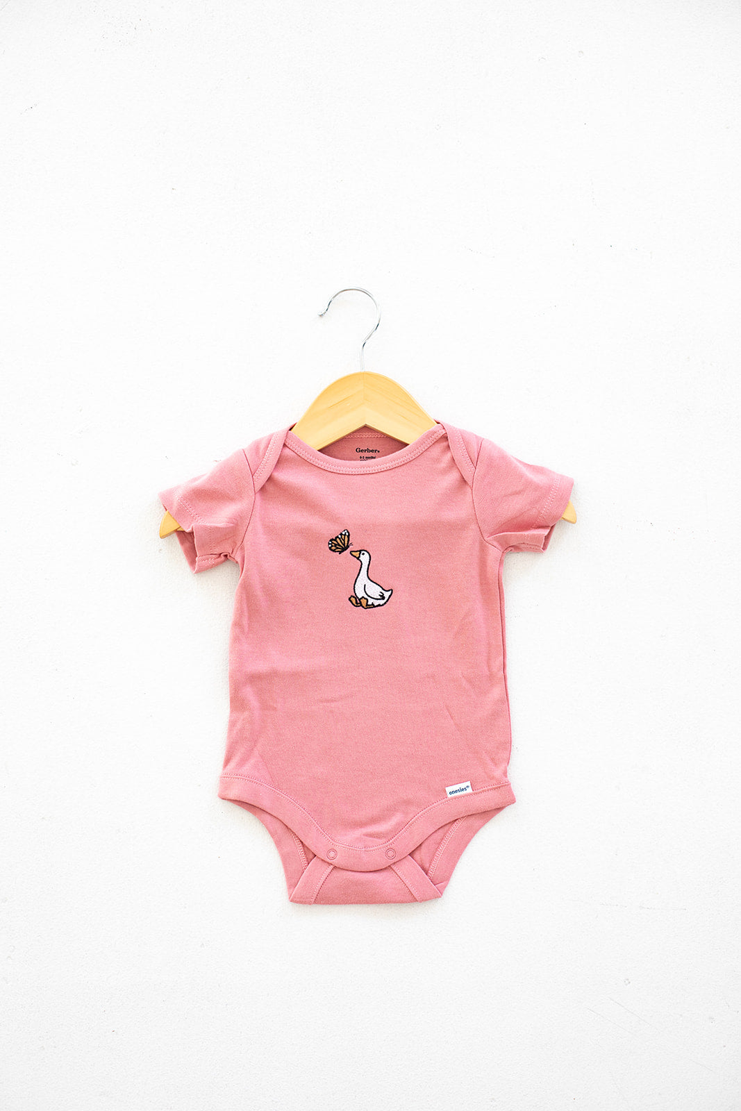 GOOSE AND BUTTERFLY BABY BODYSUIT
