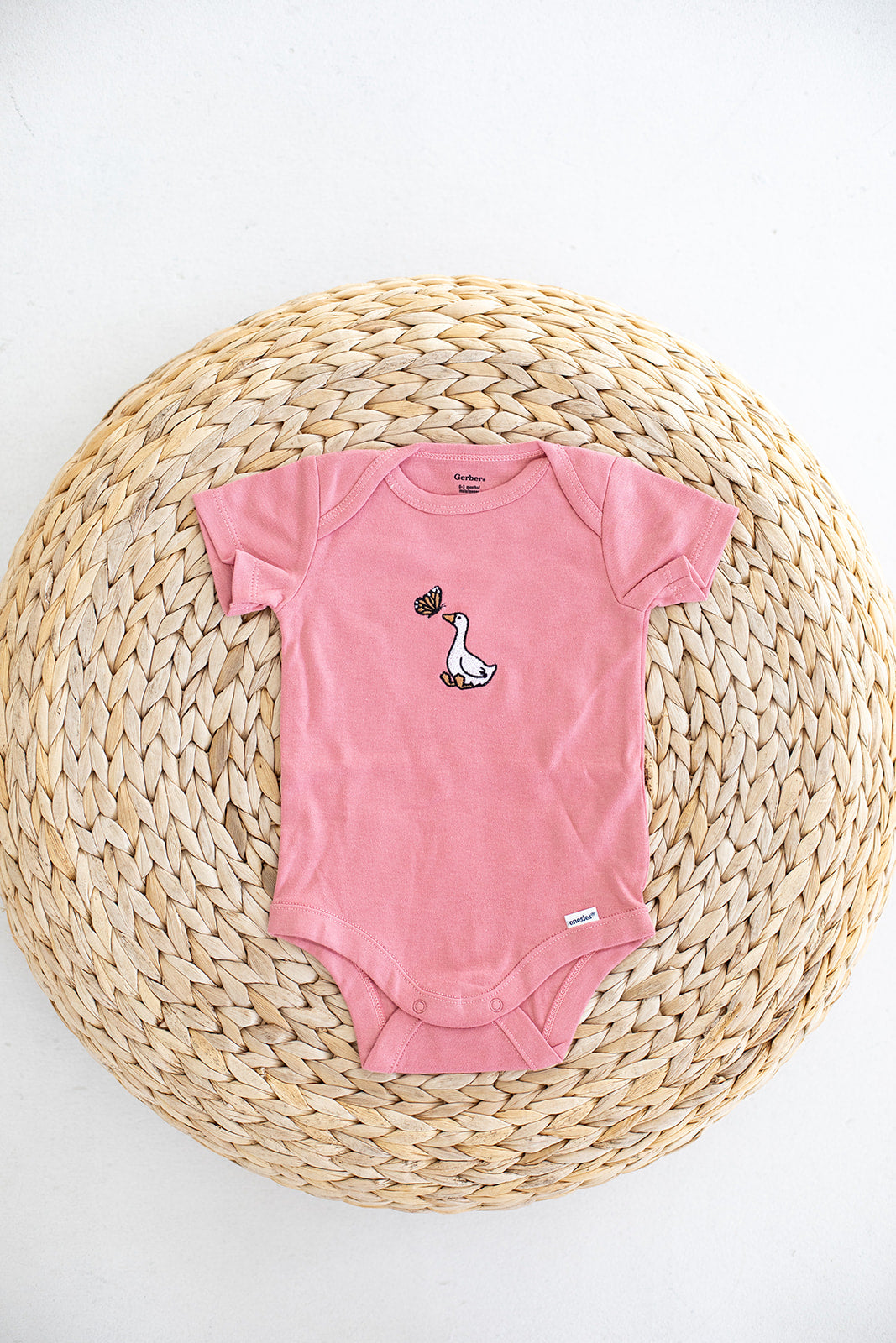 GOOSE AND BUTTERFLY BABY BODYSUIT