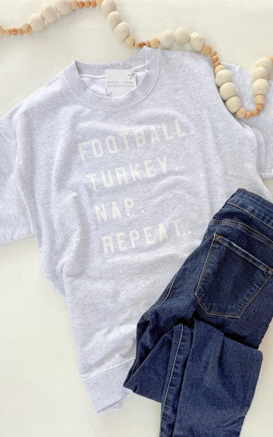 FOOTBALL. TURKEY. NAP. REPEAT. SWEATSHIRT