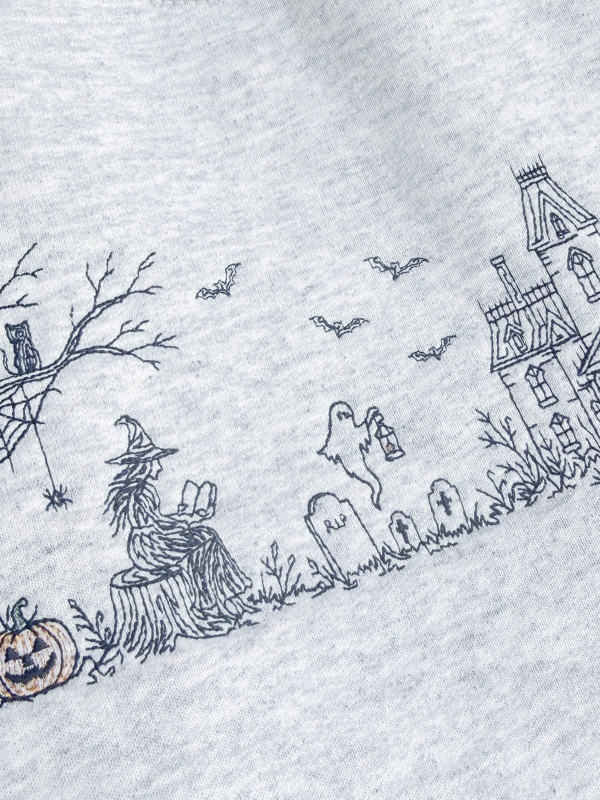 SPELLBOUND EMBROIDERED SWEATSHIRT